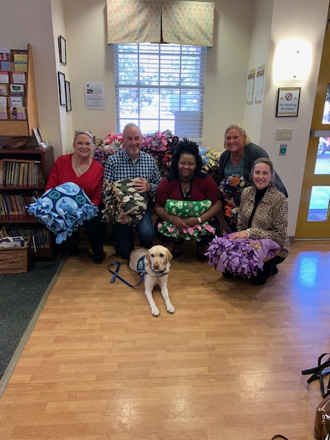 Maple Street donates blankets to kids house child advocacy center
